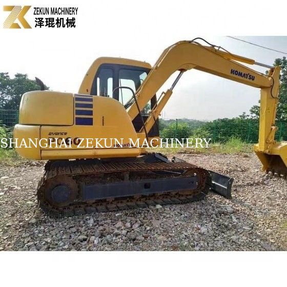 6200 กิโลกรัม น้ําหนักเครื่องใช้ Komatsu PC60-7 Excavator จากญี่ปุ่น แพมป์ไฮดรอลิกเดิม