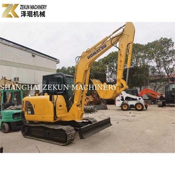 Komatsu PC56-7 เครื่องขุดขนาดเล็กที่มีน้ําหนักในการทํางาน 5 ตันและเครื่องยนต์ดีเซลที่ทนทาน