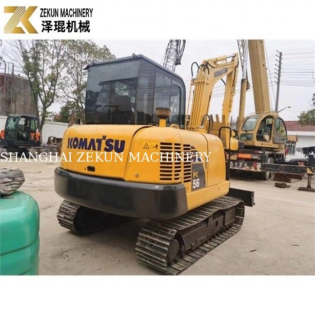 Komatsu PC56-7 เครื่องขุดขนาดเล็กที่มีน้ําหนักในการทํางาน 5 ตันและเครื่องยนต์ดีเซลที่ทนทาน