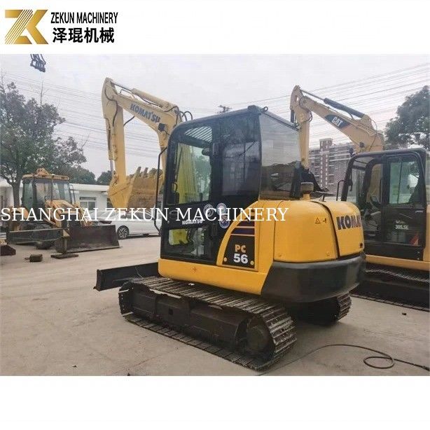 Komatsu PC56-7 เครื่องขุดขนาดเล็กที่มีน้ําหนักในการทํางาน 5 ตันและเครื่องยนต์ดีเซลที่ทนทาน