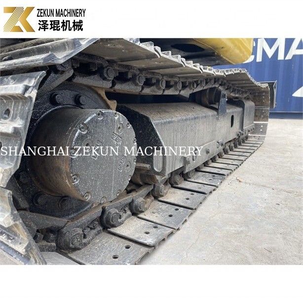 Komatsu PC56-7 เครื่องขุดขนาดเล็กที่มีน้ําหนักในการทํางาน 5 ตันและเครื่องยนต์ดีเซลที่ทนทาน