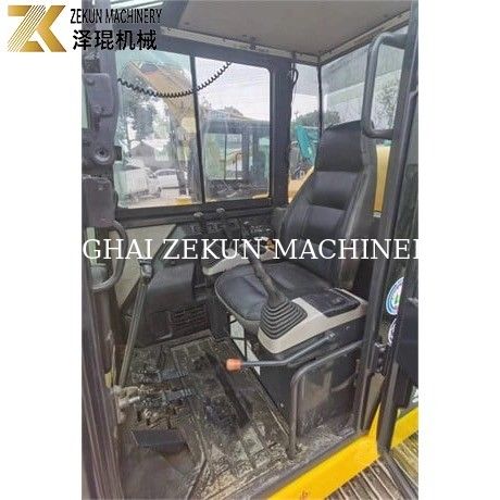 Komatsu PC56-7 เครื่องขุดขนาดเล็กที่มีน้ําหนักในการทํางาน 5 ตันและเครื่องยนต์ดีเซลที่ทนทาน