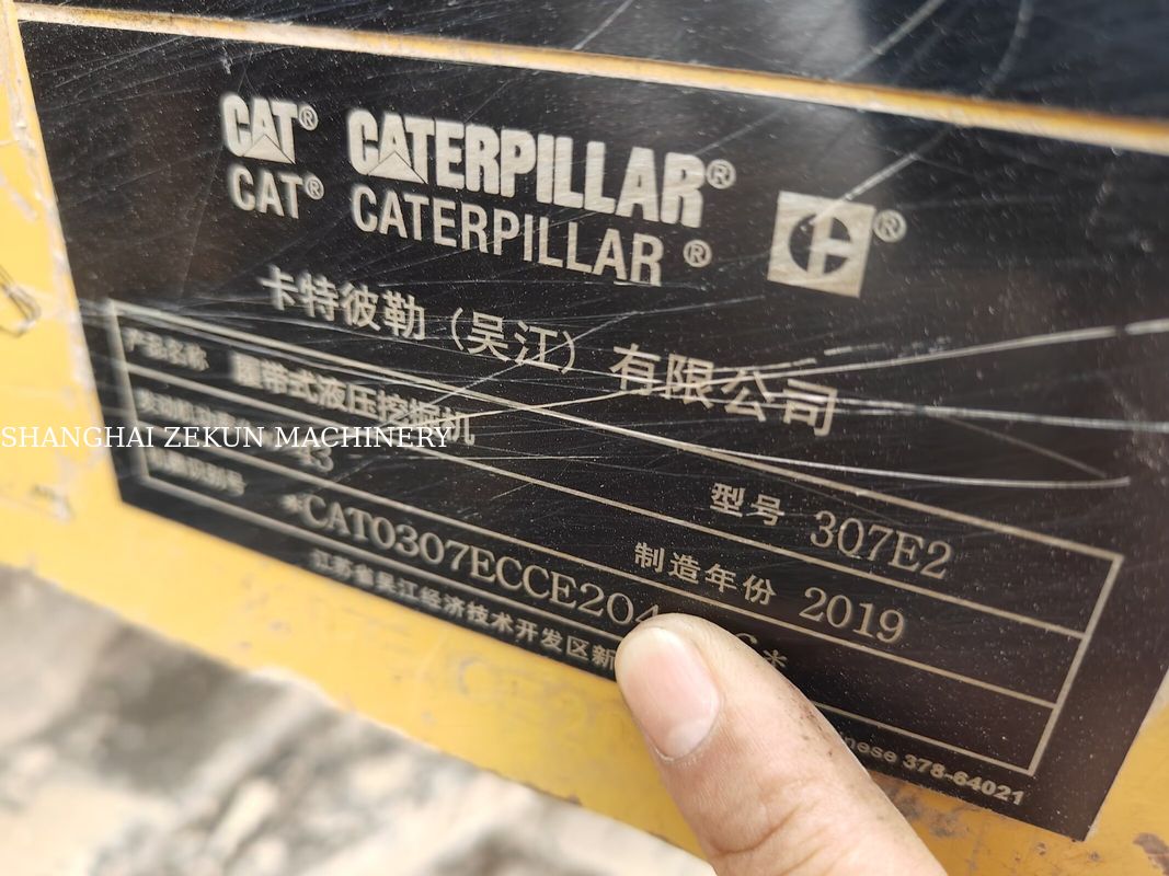 รถขุด CAT 307E2 ปี 2019 พร้อมระยะเอื้อมสูงสุดที่พื้นดิน 400 มม. และความจุถังน้ำมันเชื้อเพลิง 135 ลิตร