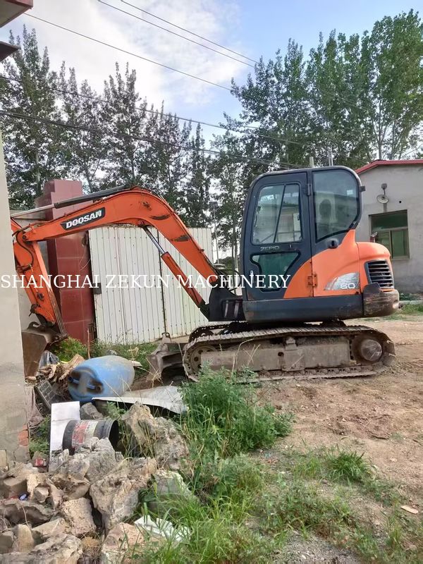 เครื่องขุด Doosan DX60 ปี 2013 ความดันไฮดรอลิก 27.5 MPa และความสูงในการขุดสูงสุด 800 มม